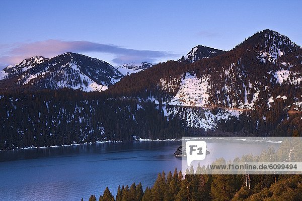 A watercolor of Emerald Bay  Wizard Island  and snow at Lake Tahoe in California