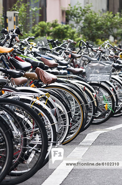Rows of parked bicycles  Tokyo  Japan.