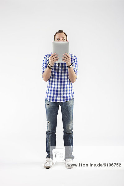 Man photographed in the studio on a white background.