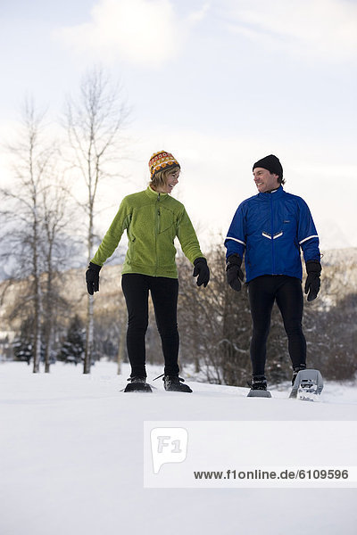Couple snowshoeing in Canada.