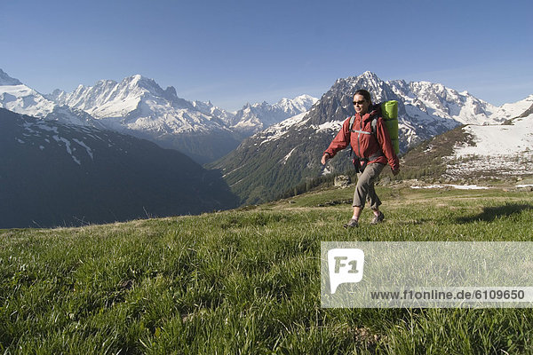 A woman hiking in the French alps.