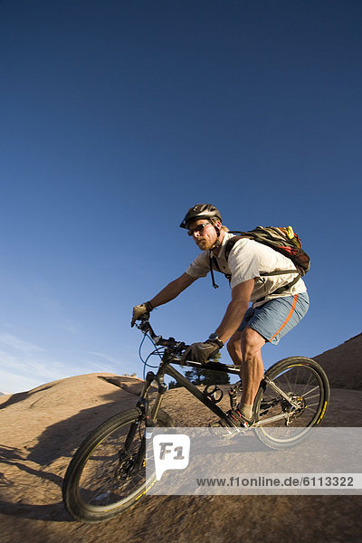 man mountain biking  Moab  Utah