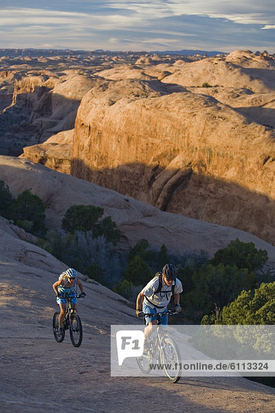 couple mountain biking  Moab  Utah