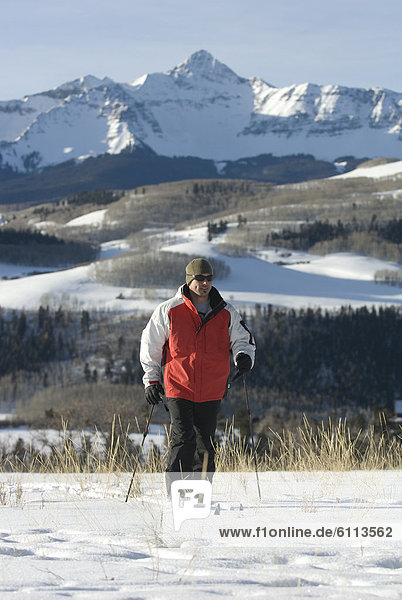 Man cross country skiing.