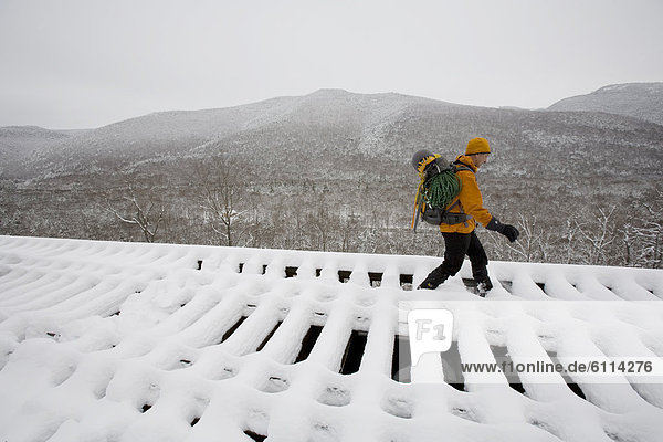Man mountaineering  New Hampshire.