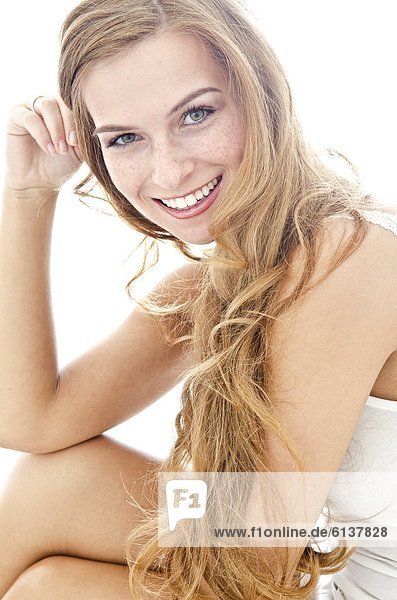 Smiling long-haired young woman