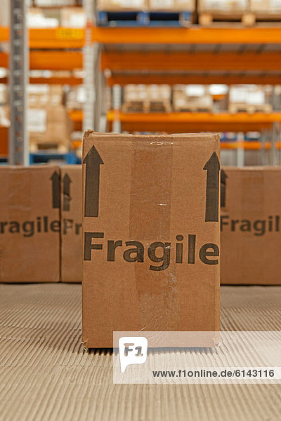 Cardboard box with the word fragile printed on it