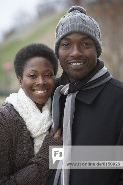 Portrait of African couple in winter clothing
