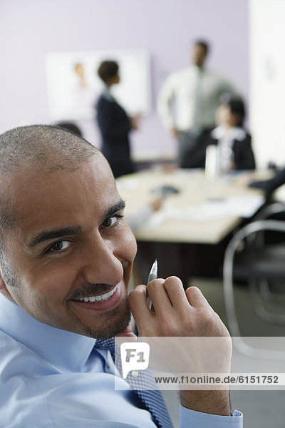 Middle Eastern businessman in conference room