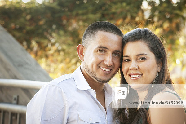 Smiling Hispanic couple