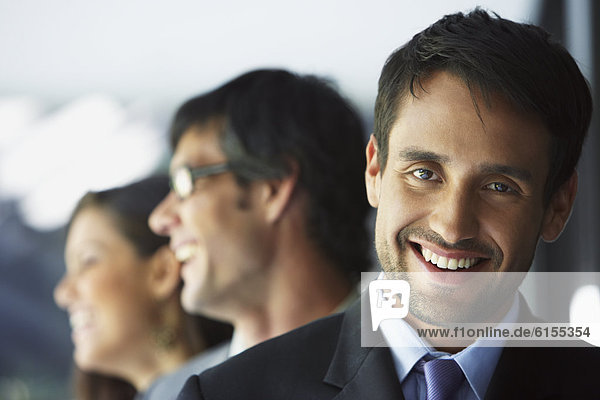 South American businesspeople laughing