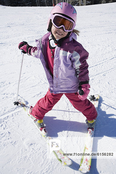 Asian girl on skis