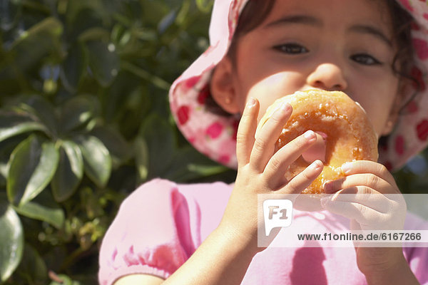 Hispanier  Donut  essen  essend  isst  Mädchen  Baby