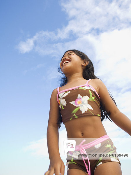 Pacific Islander girl wearing bathing suit