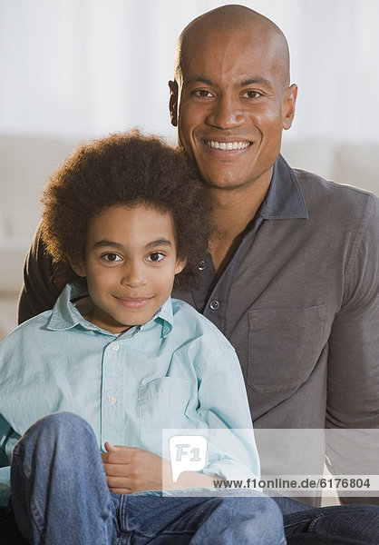 Portrait of African father and son