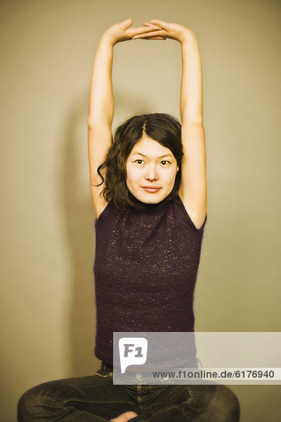 Asian Woman stretching