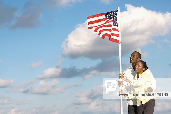 halten  Fahne  amerikanisch  multikulturell
