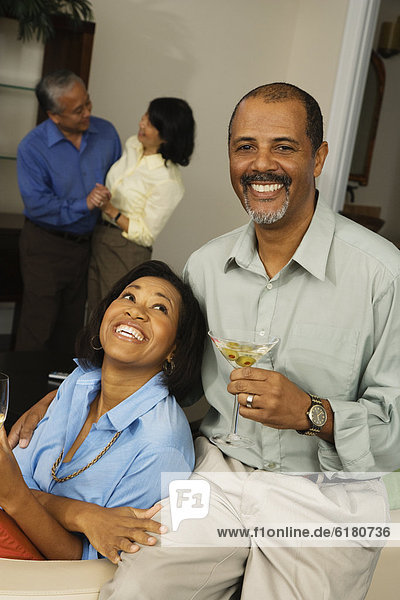 African couple with cocktails