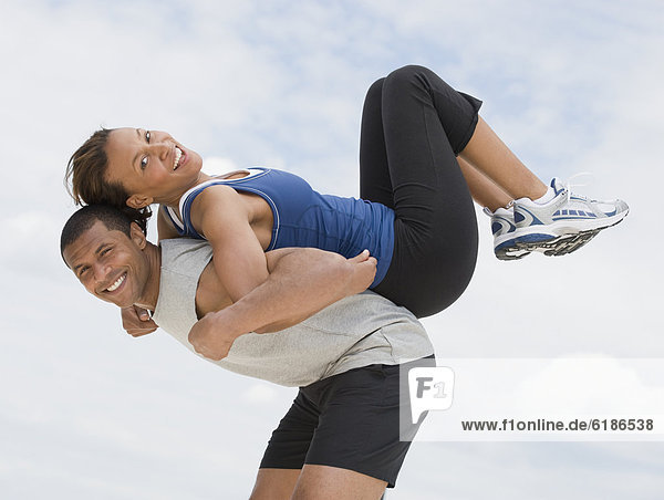 African couple in athletic clothing