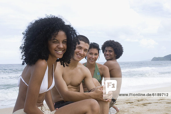 Multi-ethnic friends at beach
