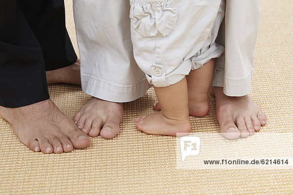 Close up of Hispanic family's feet