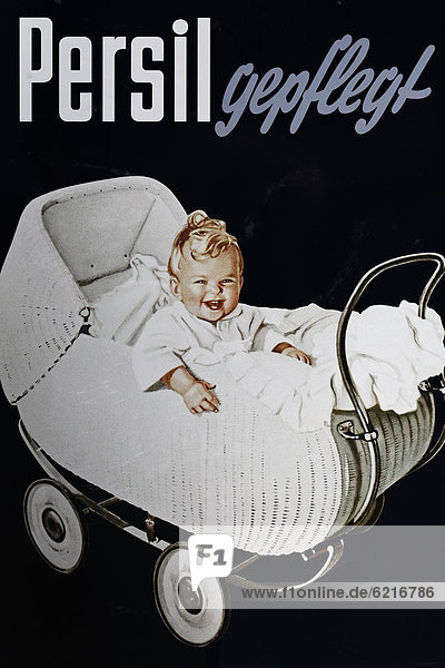 '''Persil gepflegt''  German for ''Persil well-kept''  smiling baby in white clothes sitting in a pram  washing powder poster from the 1950's  Germany  Europe'