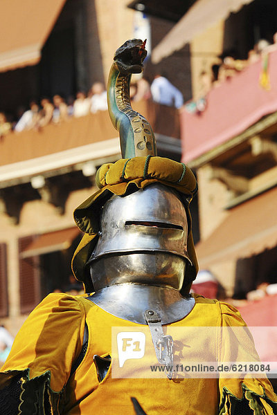 Knight's armour  people dressed in medieval costumes representing their respective city districts at the Palio  Piazza del Campo square  Siena  Tuscany  Italy  Europe