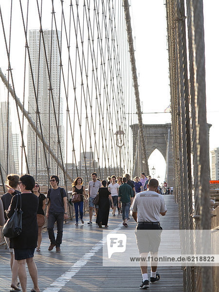 Tourists on Brooklyn Bridge  Manhattan  New York City  USA  North America  America