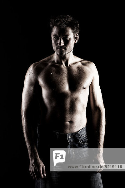 Muscular man with naked torso
