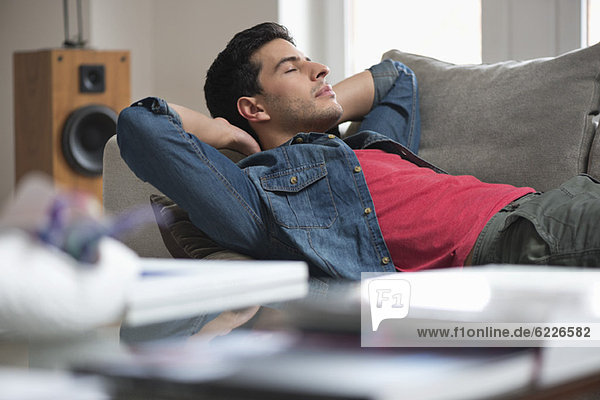 Man resting on a couch