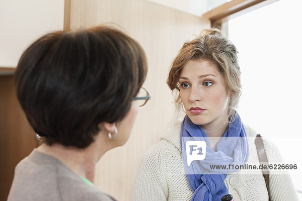 Woman talking to her mother