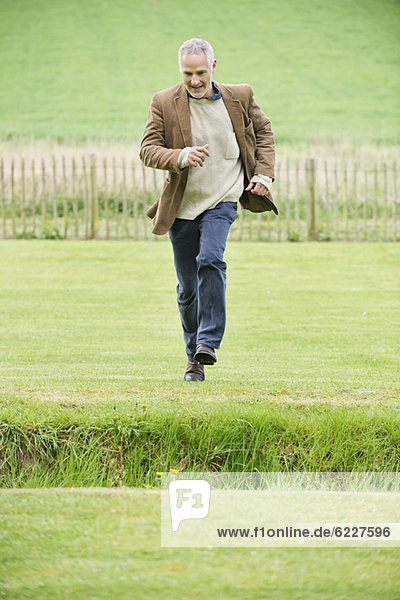 Man running in a field