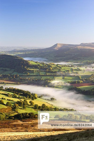 Rolling mist covered farmland in the Usk Valley  Brecon Beacons National Park  Powys  Wales  United Kingdom  Europe