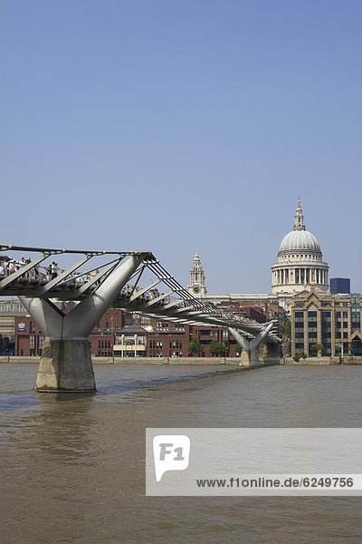 Millennium Bridge over the River Thames and St. Pauls Cathedral  London  England  United Kingdom  Europe