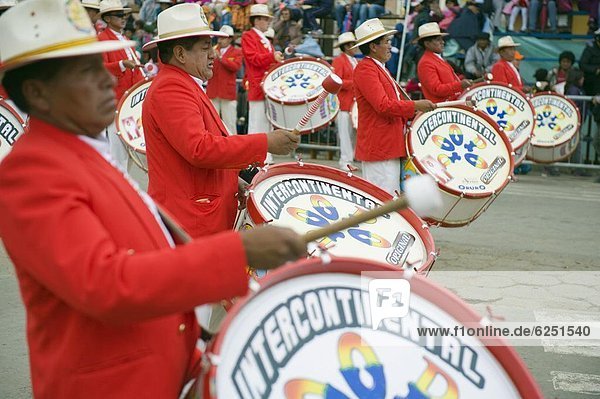 Musicans playing drums at Oruro Carnival  Oruro  Bolivia  South America