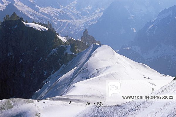View from Mont Blanc towards Grandes Jorasses  with mountaineers on Cosmiques Ridge  Mont Blanc  French Alps  France  Europe