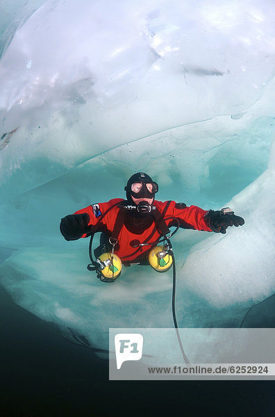 Technical ice-diving  in Lake Baikal  Olkhon island  Siberia  Russia  Eurasia