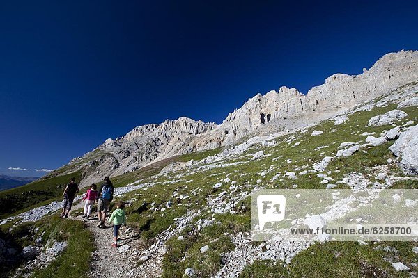 Hiking in the Latemar mountain range  Dolomites  eastern Alps  South Tyrol  Bolzano province  Italy  Europe
