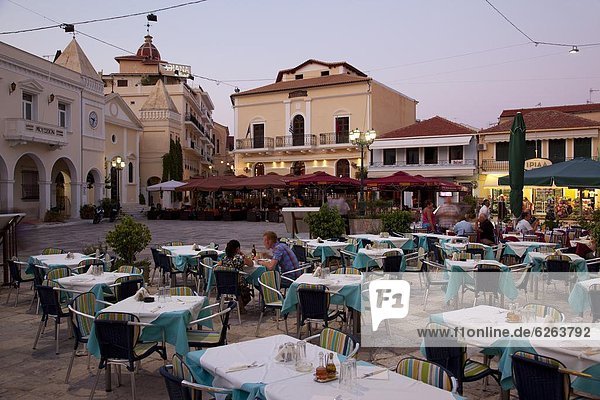 Restaurants at dusk  St. Markos Square  Zakynthos Town  Zakynthos  Ionian Islands  Greek Islands  Greece  Europe