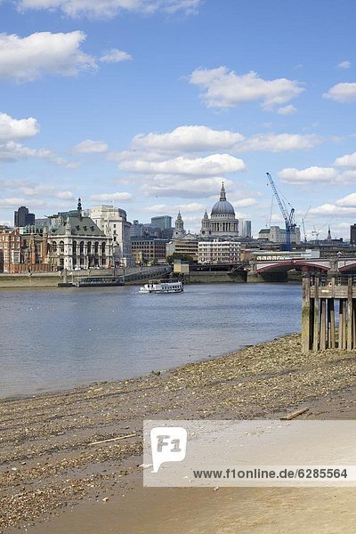 River Thames with St. Paul's Cathedral in the distance  London  England  United Kingdom  Europe