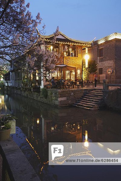 Teahouse at dusk along canal  Suzhou  Jiangsu  China  Asia