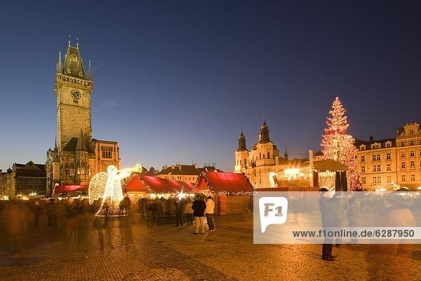 Christmas market at Staromestske (Old Town Square) with Gothic Old Town Hall  Stare Mesto (Old Town)  UNESCO World Heritage Site  Prague  Czech Republic  Europe
