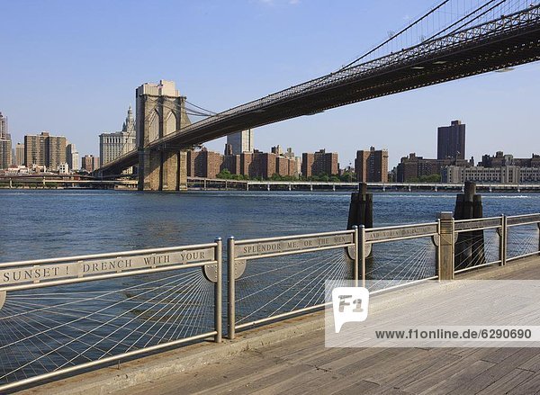 Brooklyn Bridge spanning the East River from Fulton Ferry Landing  Brooklyn  New York City  New York  United States of America  North America