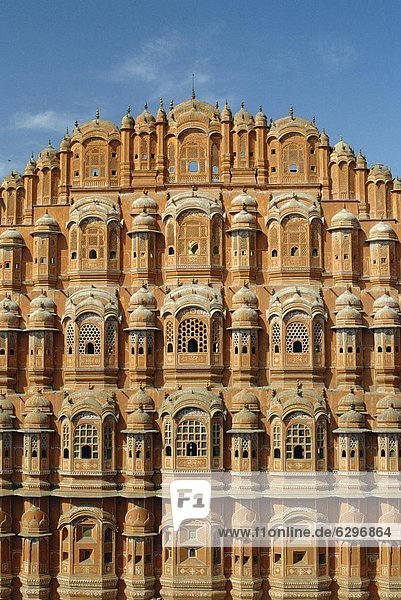 Detail of the facade of the Palace of the Winds or Hawa Mahal  showing windows for ladies in purdur to watch from  Jaipur  Rajasthan  India