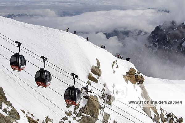 Cable cars approaching Aiguille du Midi summit  Chamonix-Mont-Blanc  French Alps  France  Europe