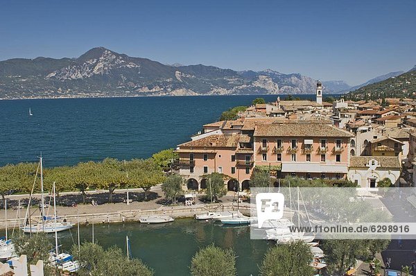 View from the castle ramparts of the harbour and town of Torre del Benaco (Torri del Benaco)  Lake Garda  Veneto  Italian Lakes  Italy  Europe