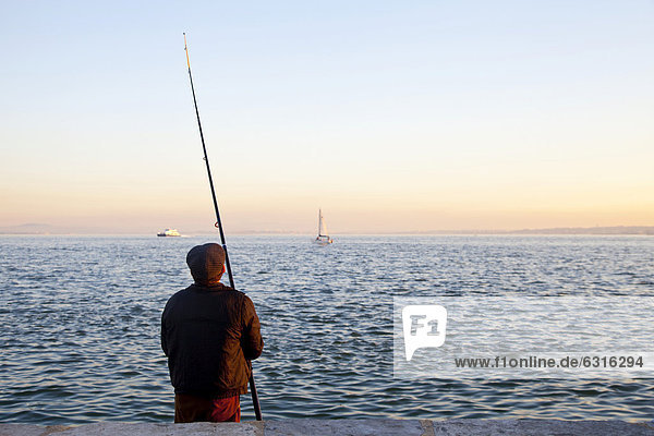 Fishing on Tagus river  Lisbon  Portugal  Europe