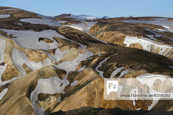 View from the Bl·hn_kur volcano to the snow-capped rhyolite mountains Landmannalaugar Fjallabak Nature Reserve Highlands Iceland Europe