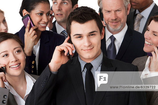 Businesspeople on cell phones