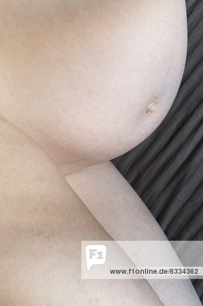 Nude pregnant woman  cropped